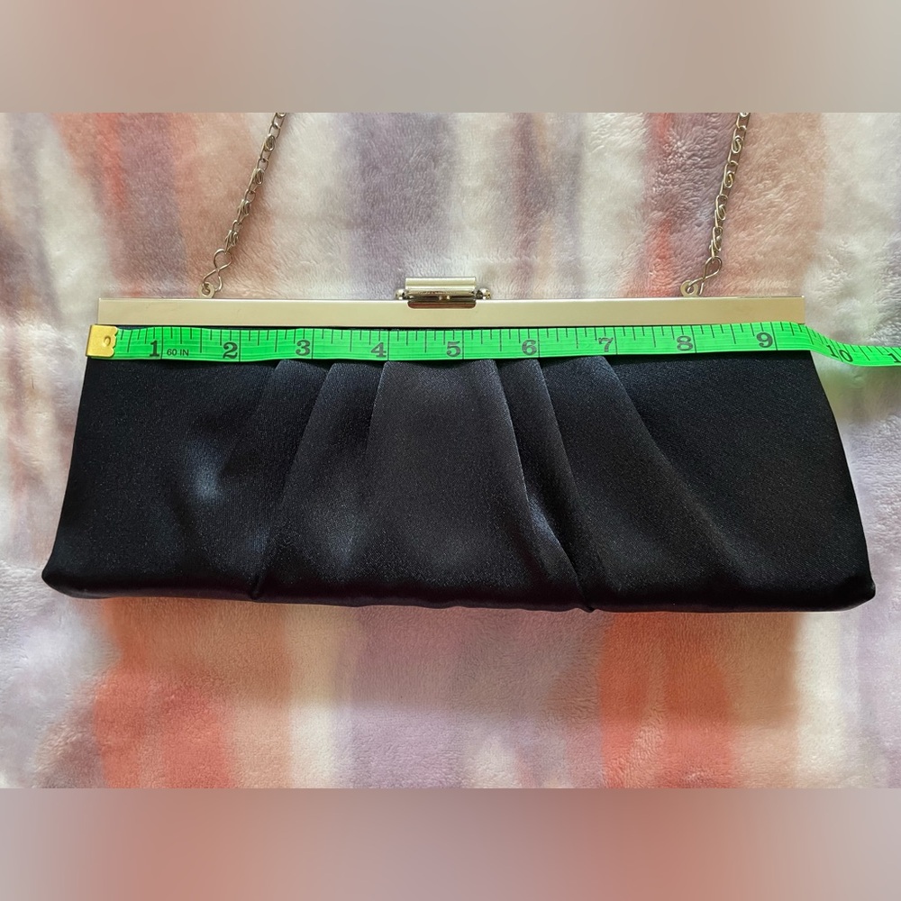 Midnight Blue Clutch with Structured Frame and Elegant Pleating